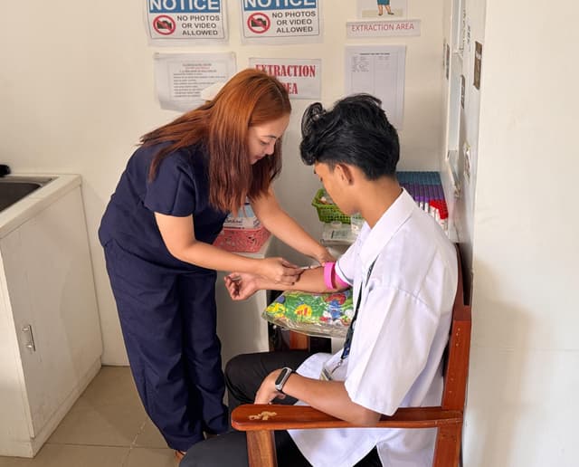 LHN Medical staff performing a blood extraction